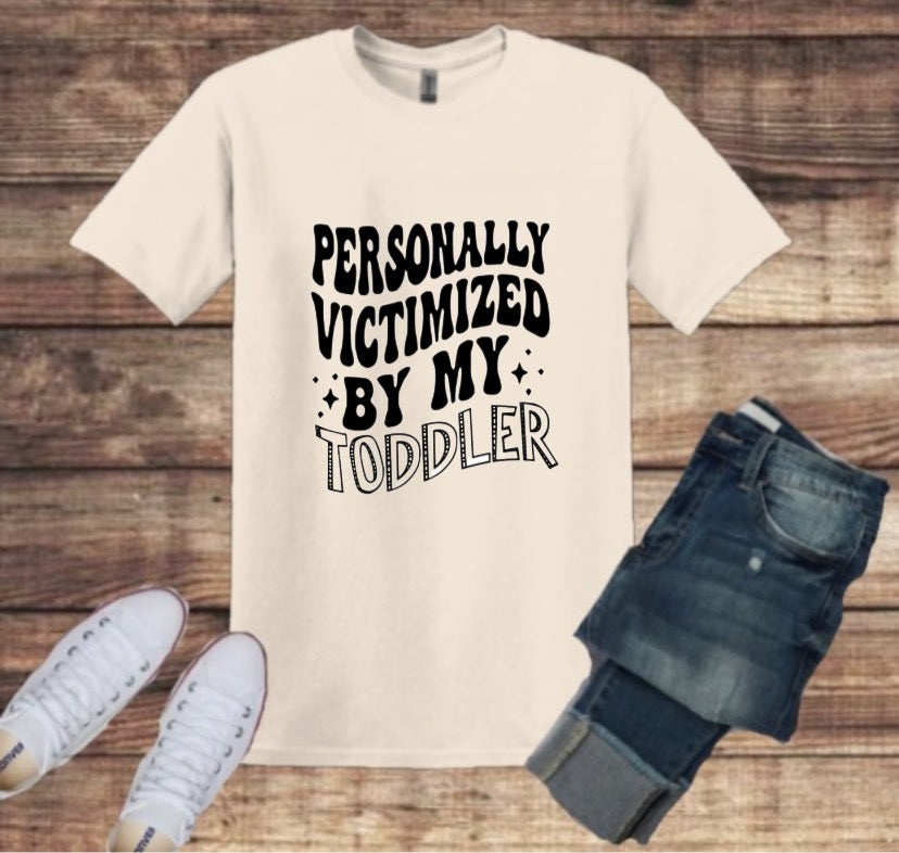 “PERSONALLY VICTIMIZED BY MY TODDLER” Tee