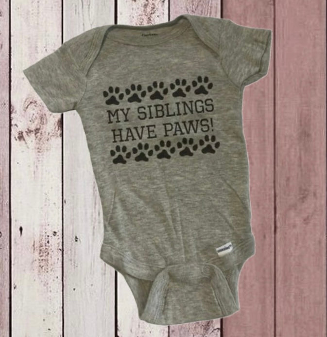 “My Siblings have paws” Onesie