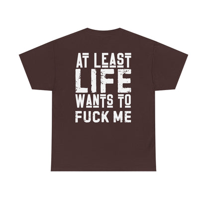 At Least Life F*cks me - Unisex Heavy Cotton Tee