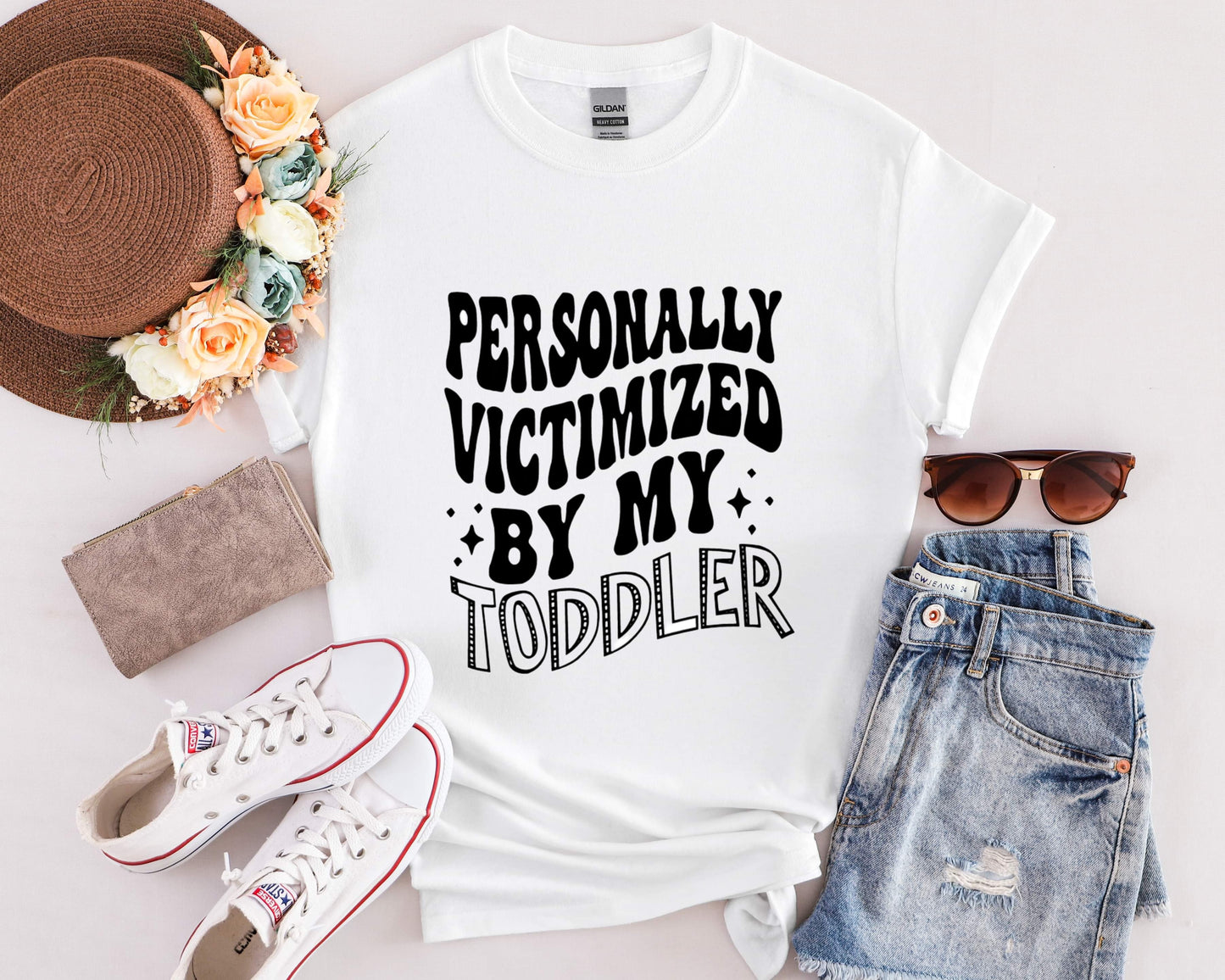 “PERSONALLY VICTIMIZED BY MY TODDLER” Tee